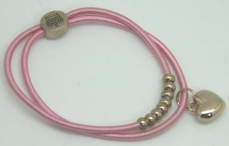 Dobbelt rosa hårelastikker, med guld farvet hjerte vedhæng og perler.
