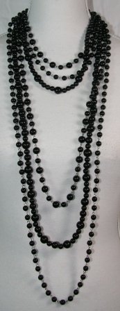 6 rækker sorte plastik perler, i forskellige rækker og perler