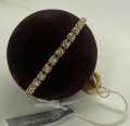 Meget smuk julekugle i hrd plast, med bordeaux velour og med  similisten  rundt om, mler 11 cm.