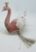Svane i bld lyserd stof, til at hnge med kugler under, fjer som vinger og krone p hovedet. ca. 15 x 22 cm